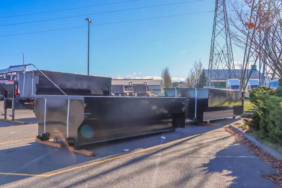 Roll-off dumpster ready for waste disposal at job site for Construction Dumpster Rental in Hattiesburg